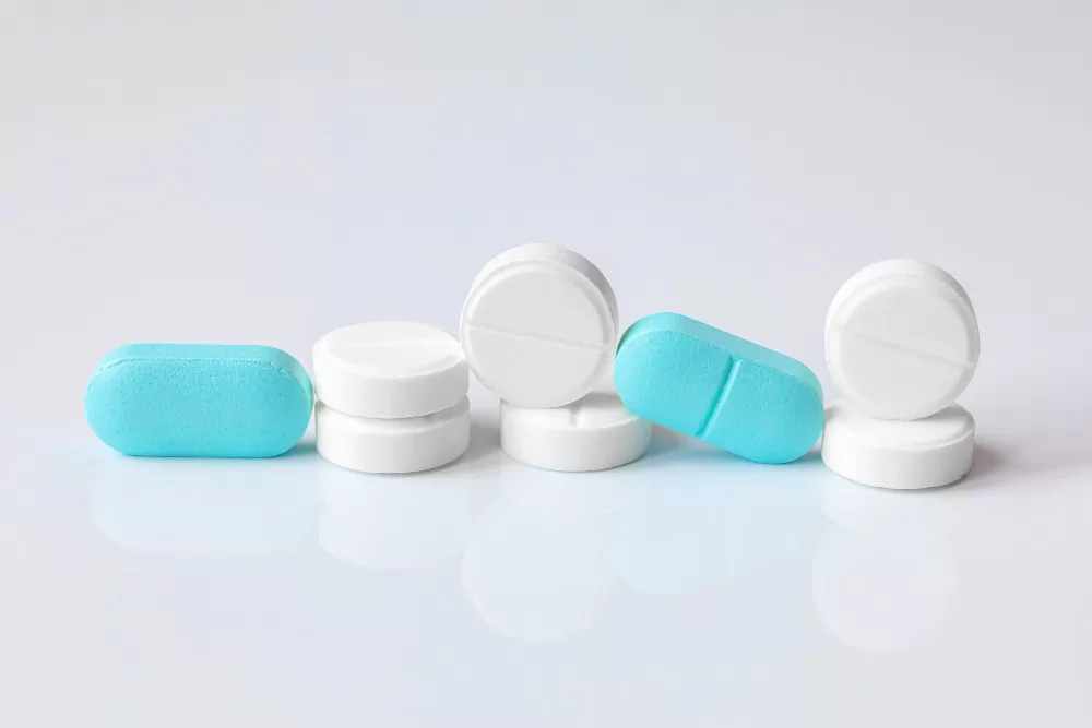 Coated tablets and capsules