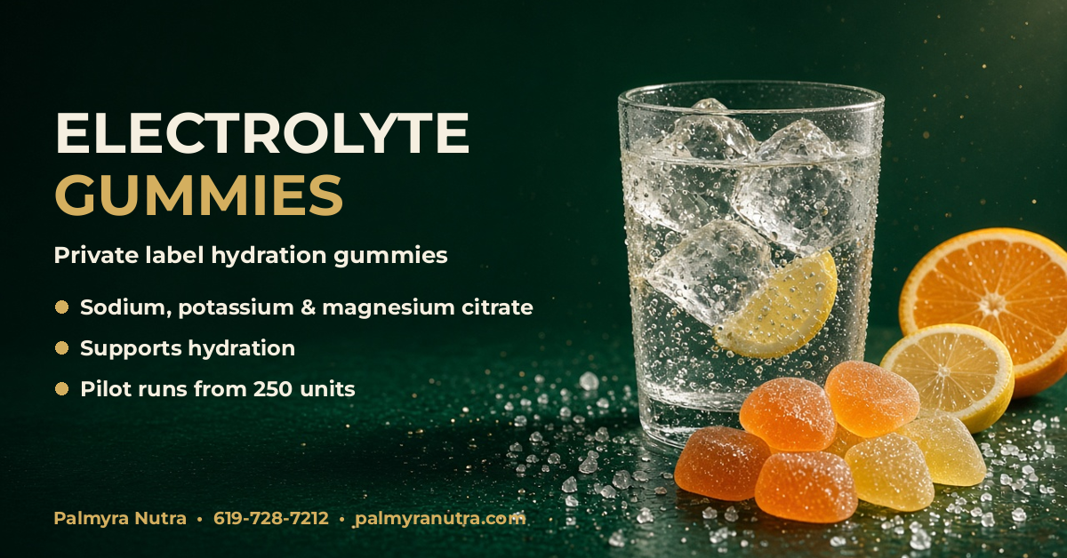Electrolyte gummies beside a glass of ice water with citrus slices.